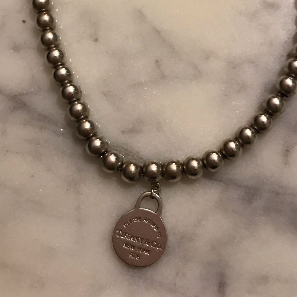 Tiffany & Co. silver bracelet with round charm